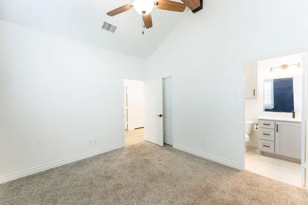 an empty room with fireplace