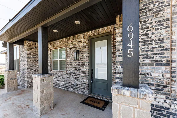 a front view of a building with glass door