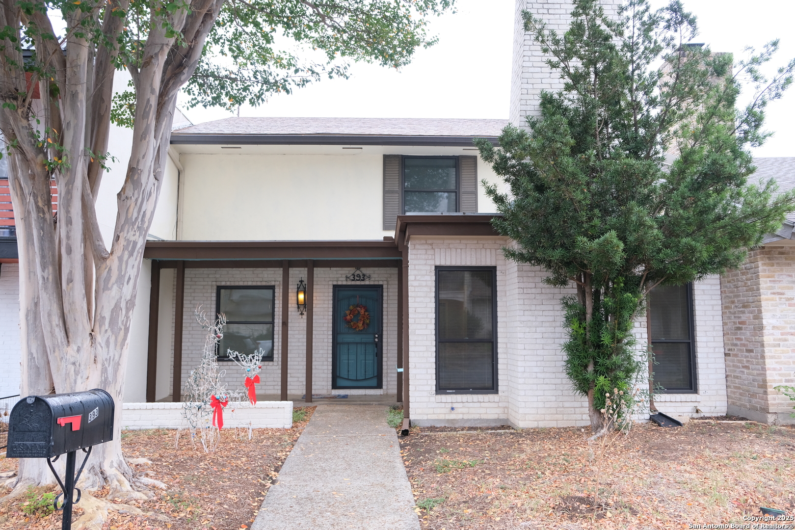 a view of a house with patio