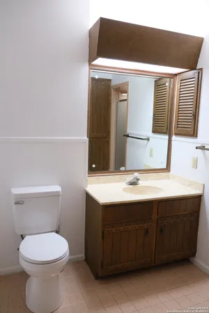 a bathroom with a sink and a toilet