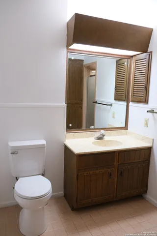 a bathroom with a sink and a toilet