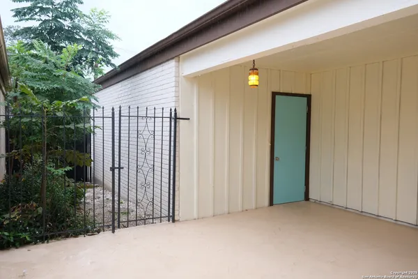 a view of a room with rack on the wall