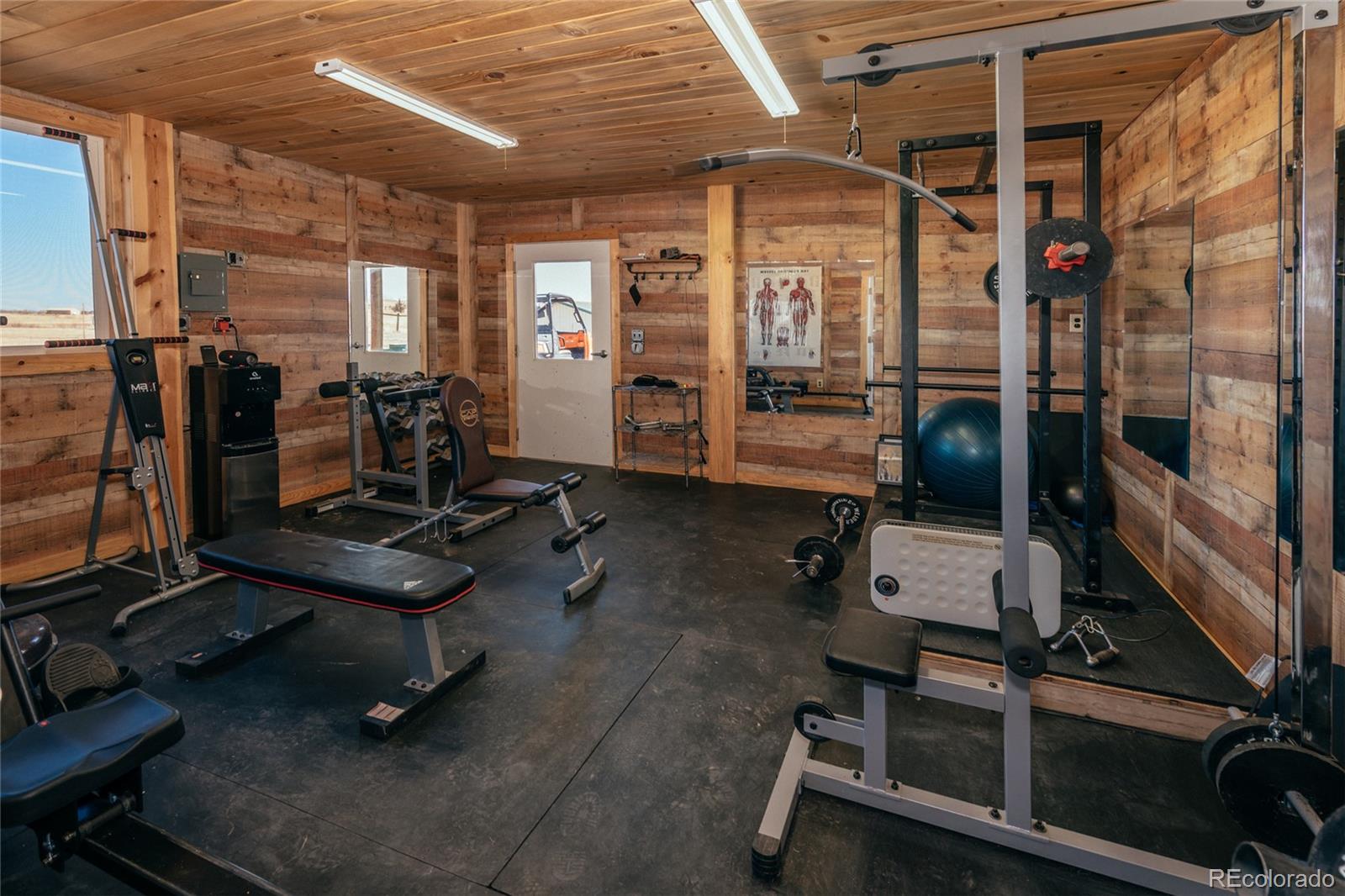 10320 Miners Lake Road Fort Collins, CO 80524 - Photo 26 of 39 a view of a room with gym equipment