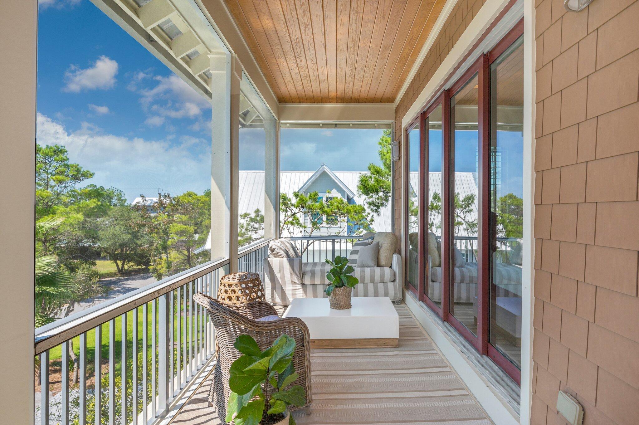 207 Betty Street Santa Rosa Beach, FL 32459 - Photo 17 of 27 a view of a balcony with wooden floor