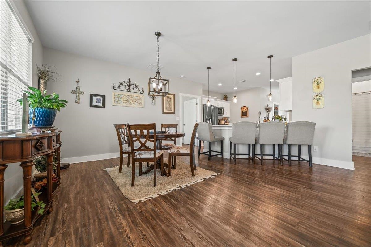 415 Abbey Road, Unit D Munford, TN 38058 - Photo 10 of 35 Open-concept living space with wood-finish flooring