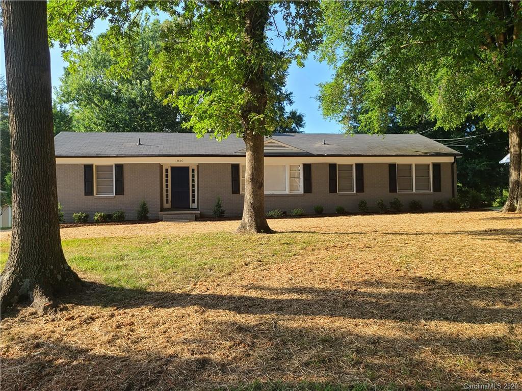 1820 Linwood Road Gastonia, NC 28052 - Photo 2 of 24 a view of a house with a swimming pool