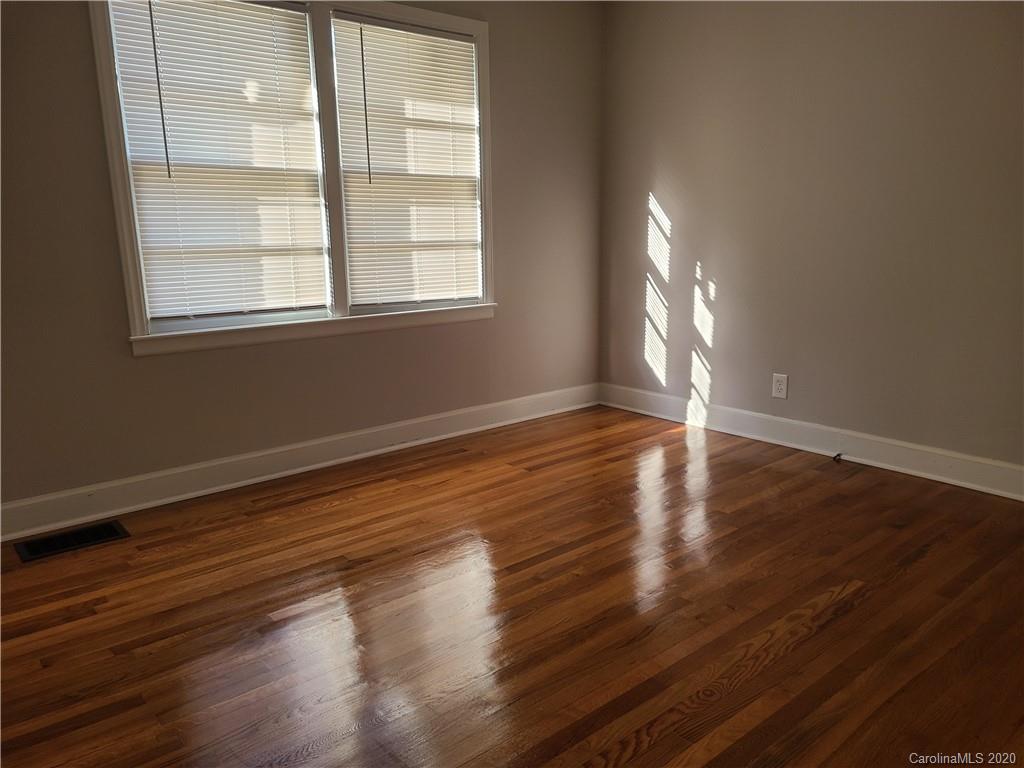 1820 Linwood Road Gastonia, NC 28052 - Photo 17 of 24 a view of empty room with wooden floor and fan