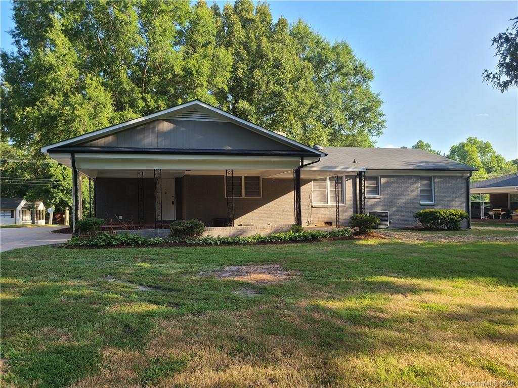 1820 Linwood Road Gastonia, NC 28052 - Photo 23 of 24 a front view of a house with a garden