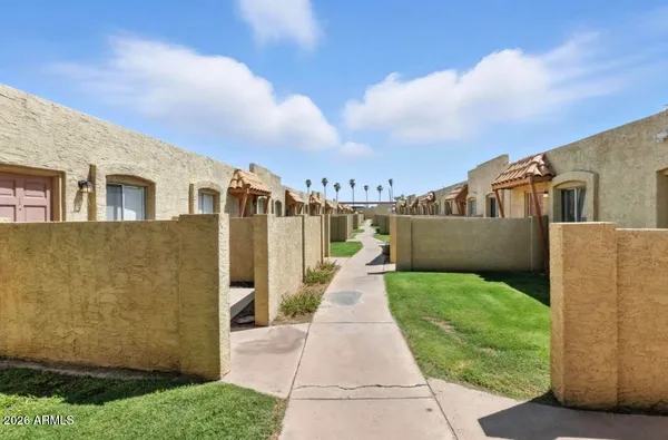 a view of a back yard of the house