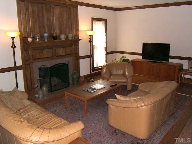 Very large Living Room with hardwood floors & fireplace. Living Room