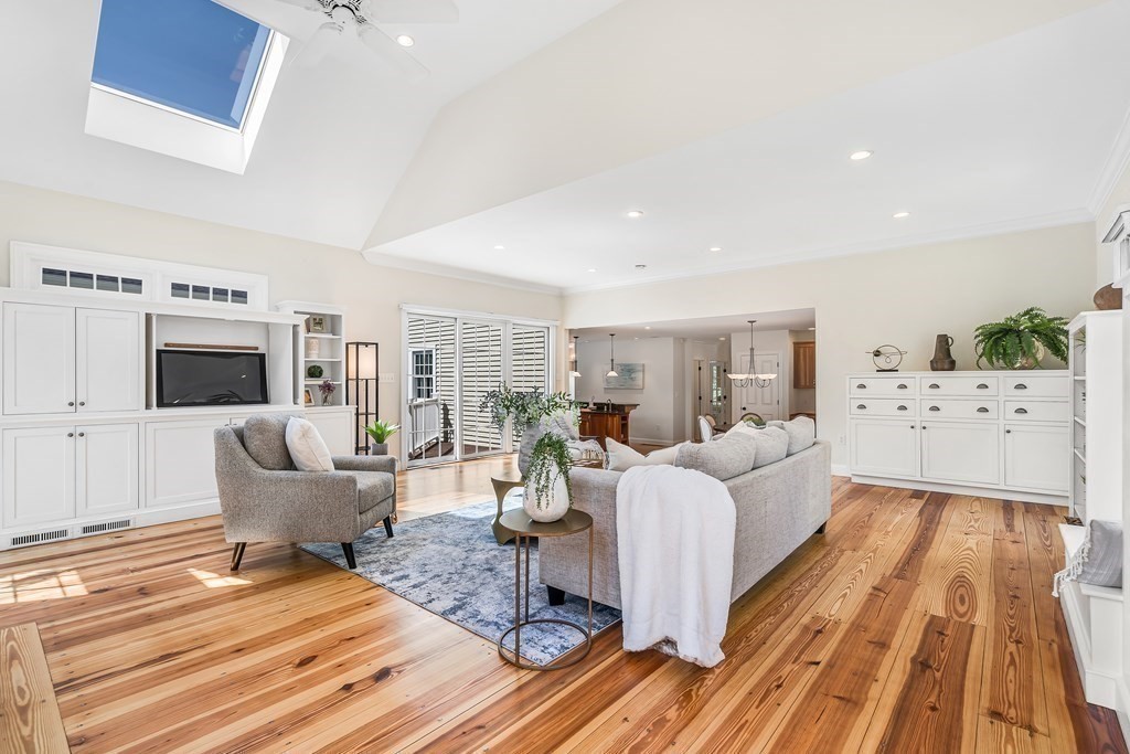 96 Pilgrim Road Concord, MA 01742 - Photo 11 of 24 a living room with furniture fireplace and flat screen tv