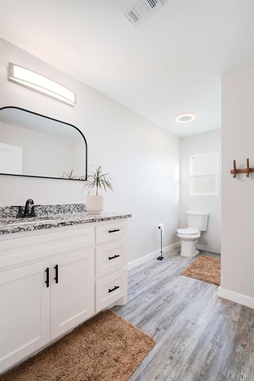 600 Private Road Brookston, TX 75421 - Photo 11 of 26 a bathroom with a sink and a toilet