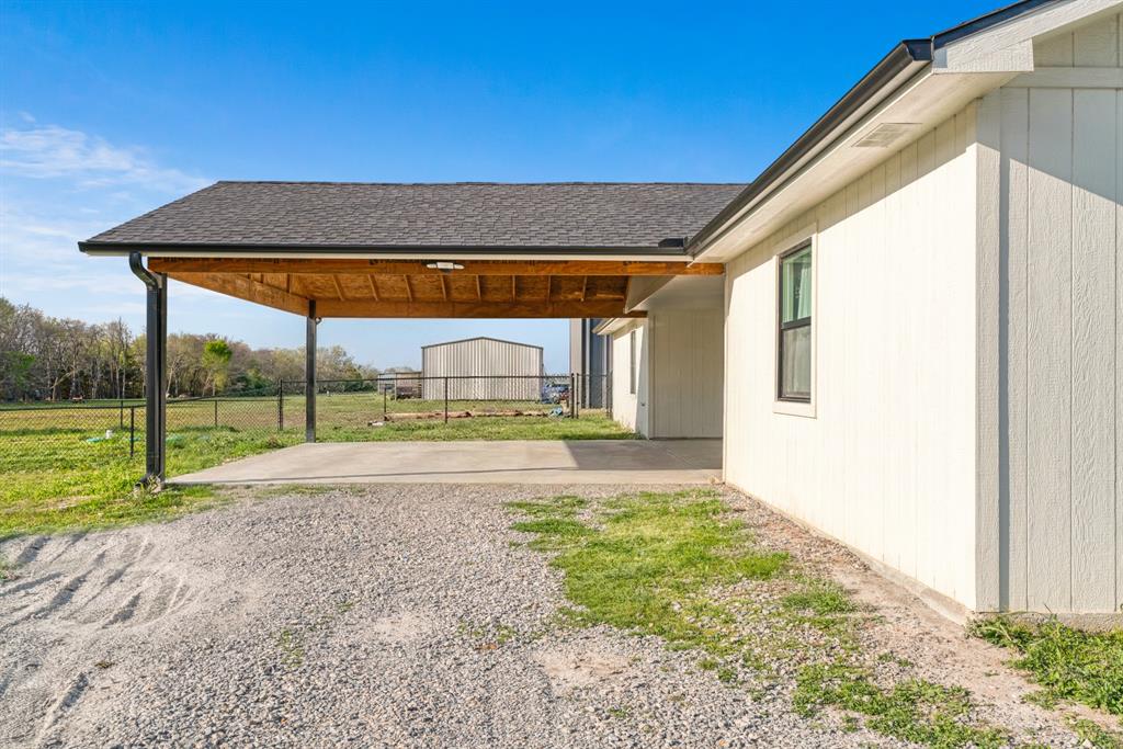 600 Private Road Brookston, TX 75421 - Photo 20 of 26 a view of a house with a big yard