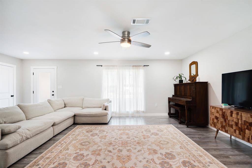 600 Private Road Brookston, TX 75421 - Photo 2 of 26 a living room with furniture and a flat screen tv