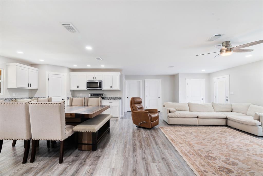 600 Private Road Brookston, TX 75421 - Photo 3 of 26 a living room with furniture and a wooden floor