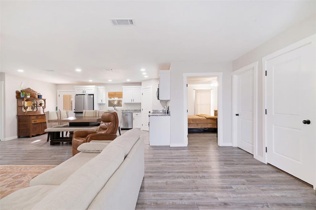600 Private Road Brookston, TX 75421 - Photo 4 of 26 a living room with furniture and a wooden floor