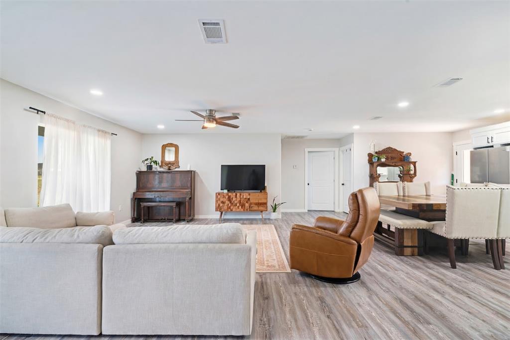 600 Private Road Brookston, TX 75421 - Photo 5 of 26 a living room with furniture and a wooden floor