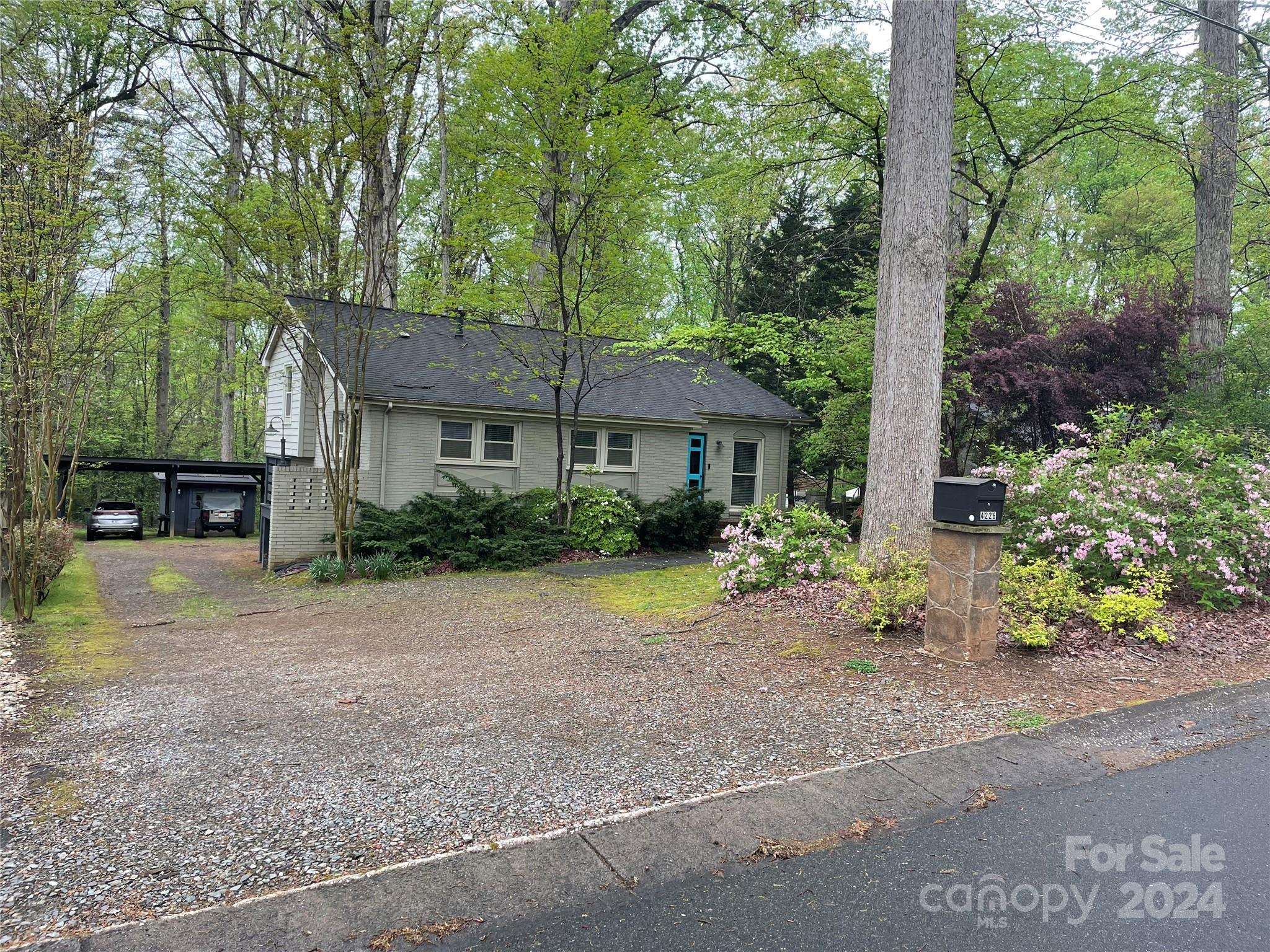 4226 Wright Avenue Charlotte, NC 28211 - Photo 1 of 1 a front view of a house with garden