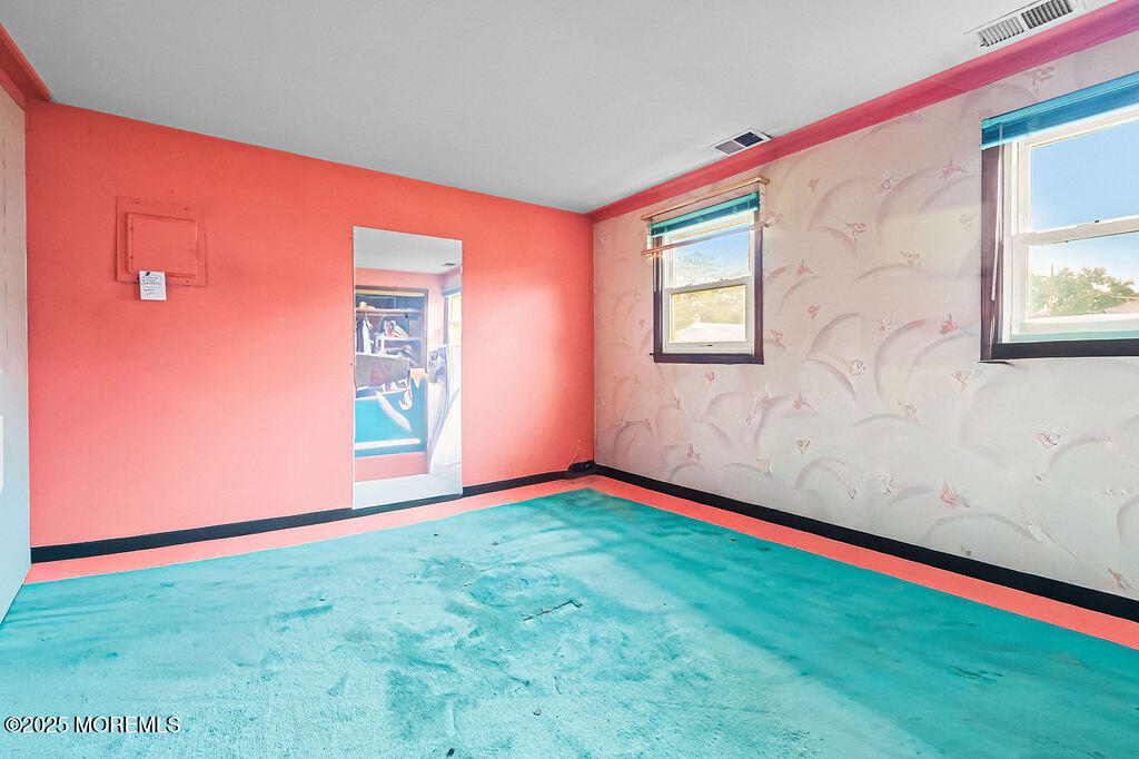 308 Stone Road Hazlet, NJ 07730 - Photo 21 of 58 a view of empty room with window