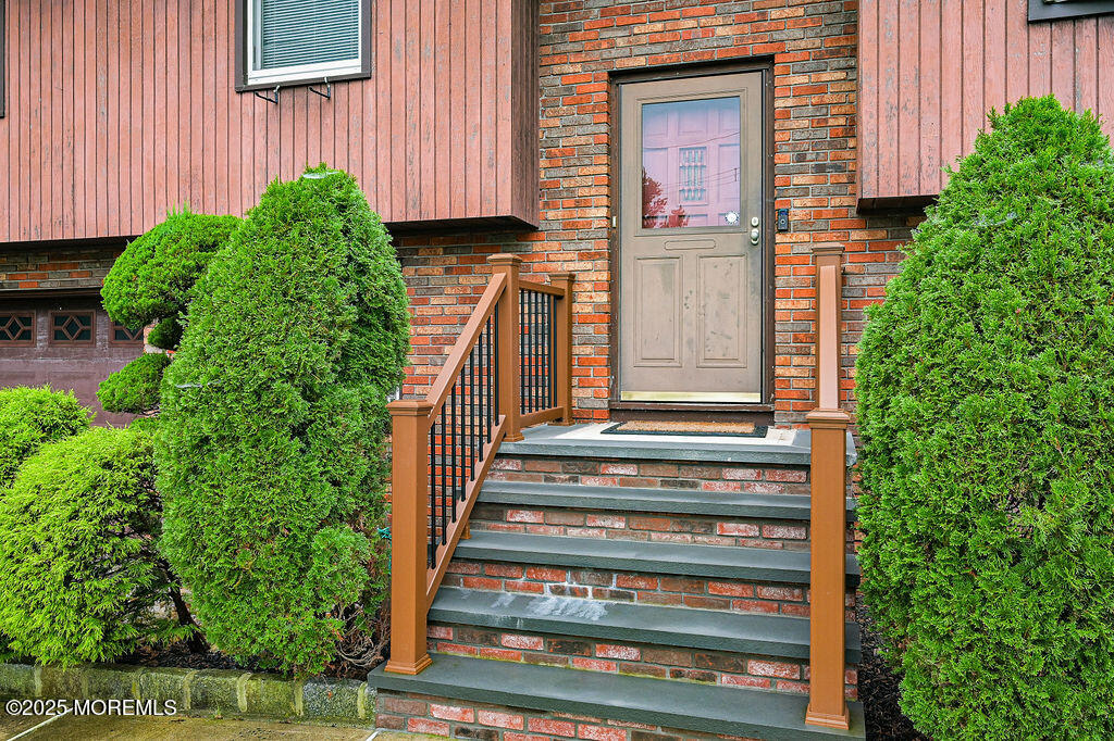 308 Stone Road Hazlet, NJ 07730 - Photo 32 of 58 a view of a house with a window and stairs