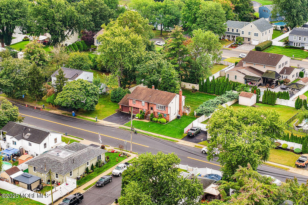 308 Stone Road Hazlet, NJ 07730 - Photo 47 of 58 an aerial view of a house with a garden