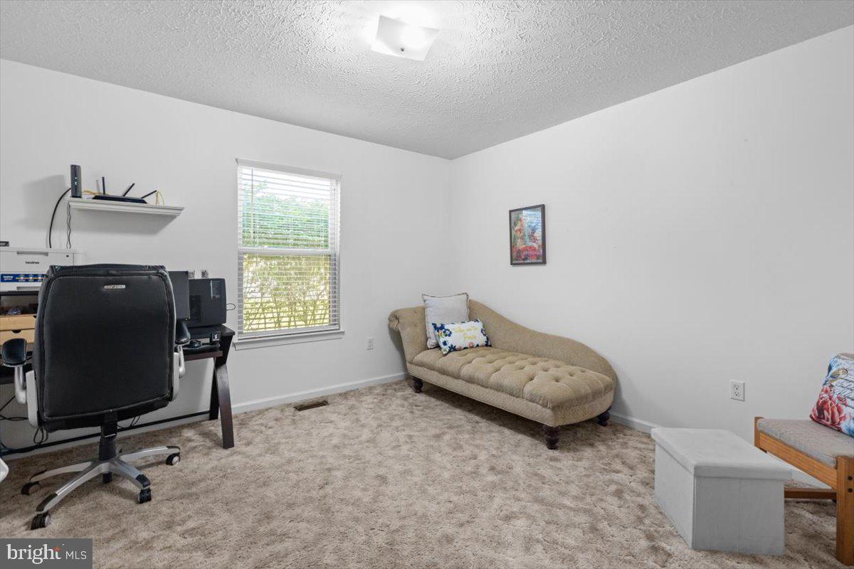 116 Ware Place Winchester, VA 22602 - Photo 13 of 28 a living room with furniture and a window