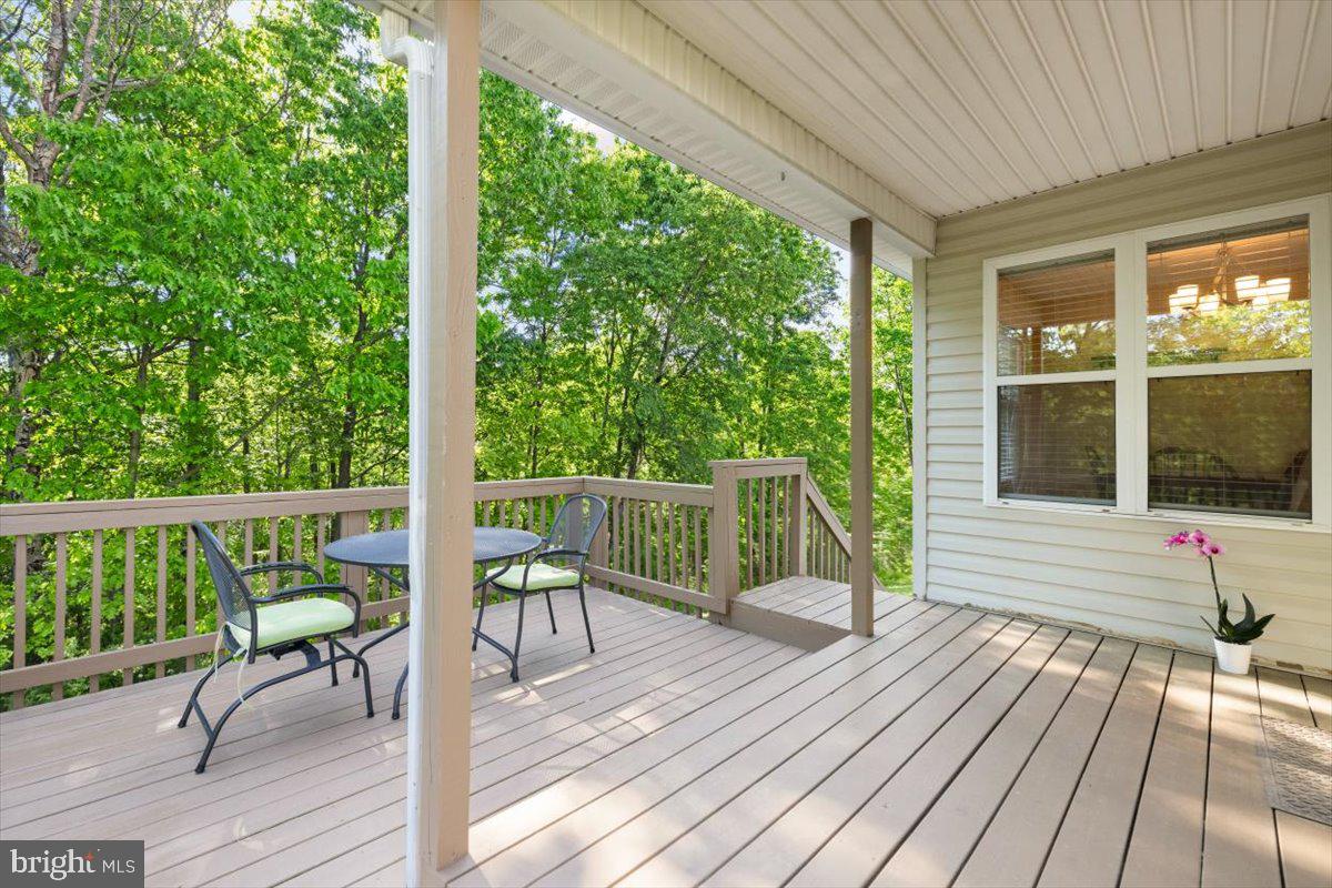 116 Ware Place Winchester, VA 22602 - Photo 22 of 28 a view of balcony with wooden floor and outdoor seating