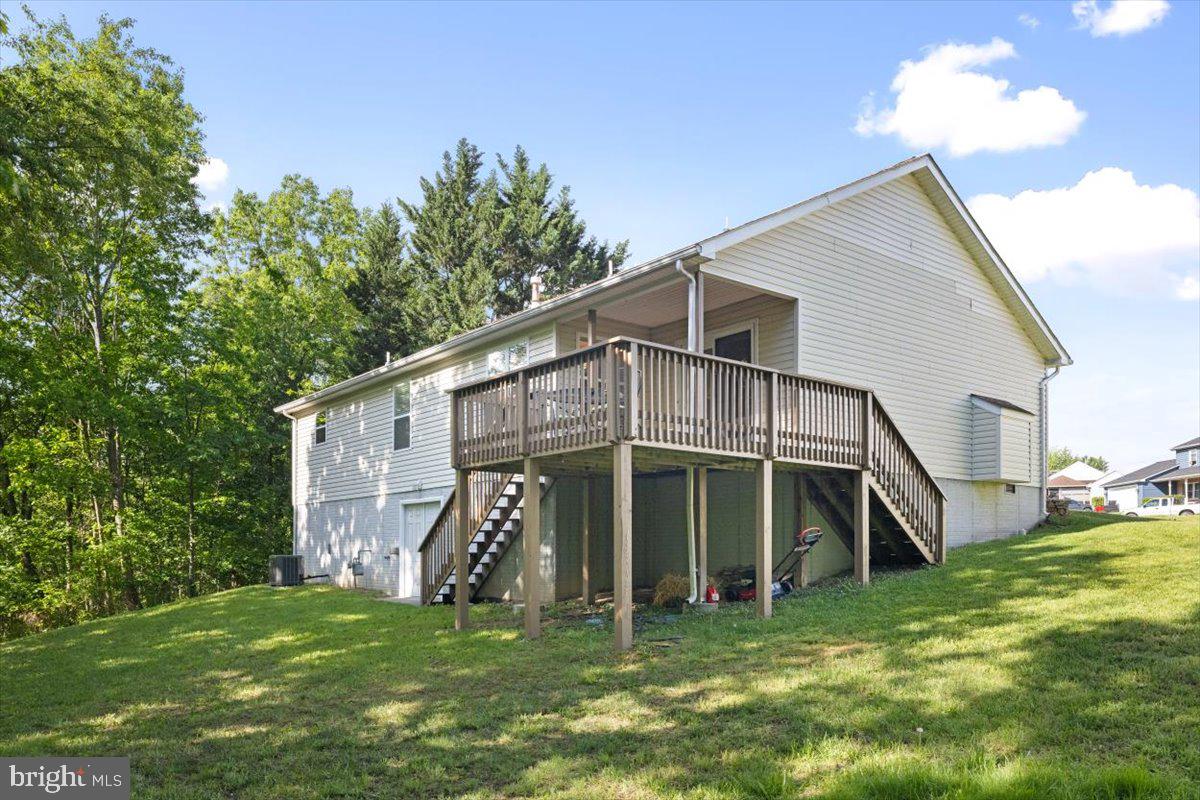116 Ware Place Winchester, VA 22602 - Photo 25 of 28 a view of a house with a yard