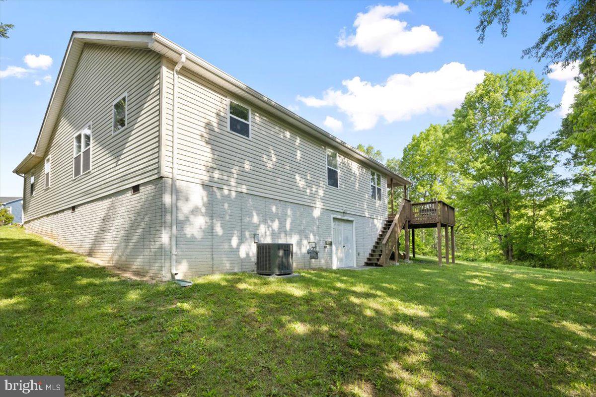 116 Ware Place Winchester, VA 22602 - Photo 26 of 28 a view of a house with a yard