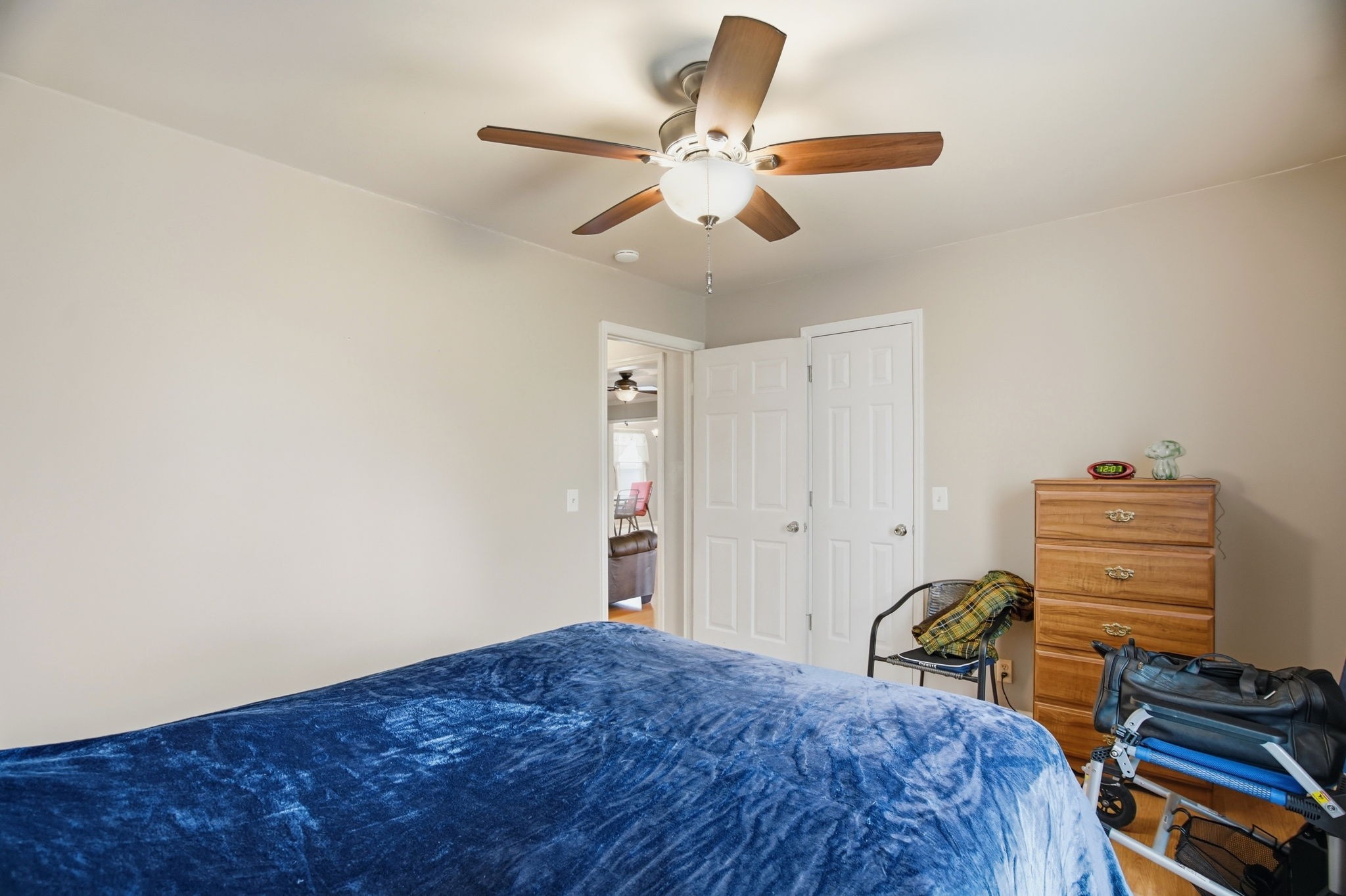 4971 Hyde Road Springfield, TN 37172 - Photo 19 of 45 a bedroom with bed and a chandelier