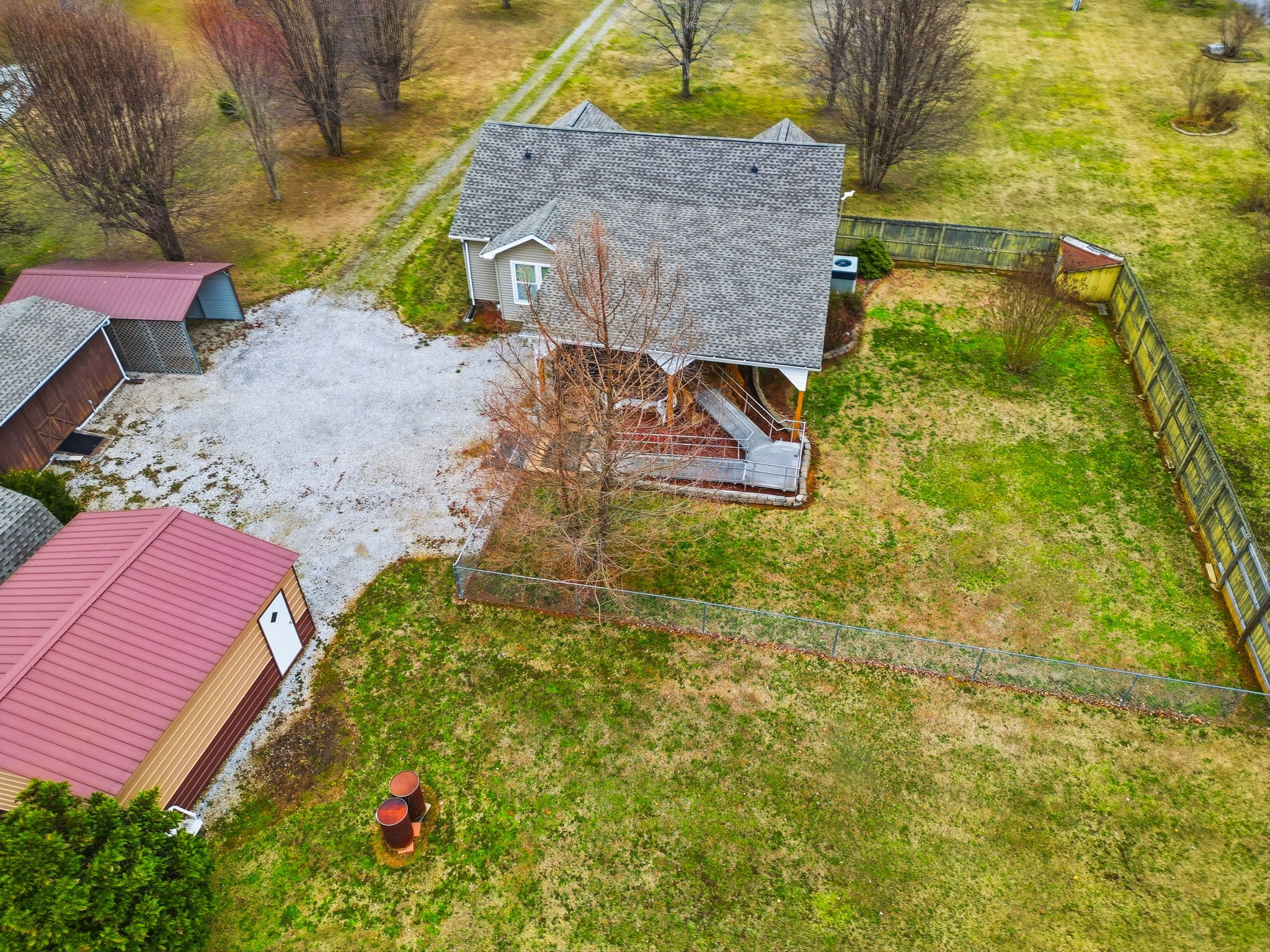 4971 Hyde Road Springfield, TN 37172 - Photo 43 of 45 a aerial view of a house with table and chairs and a yard