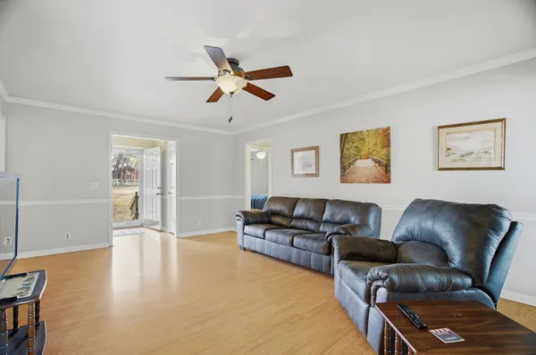 a living room with furniture and a window