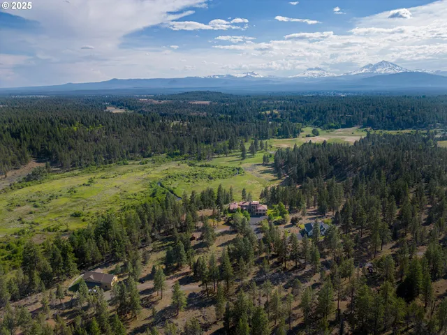 a view of a lake with green space