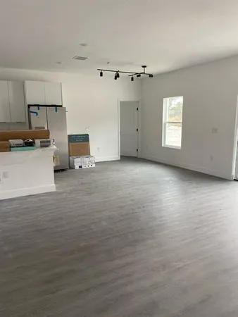 a view of a kitchen with a sink