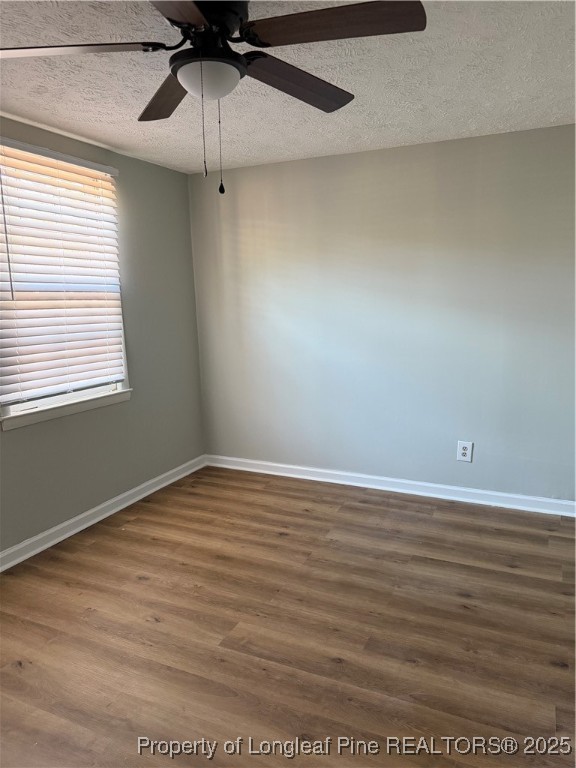 415 Vass Road Spring Lake, NC 28390 - Photo 11 of 12 a view of an empty room with a window