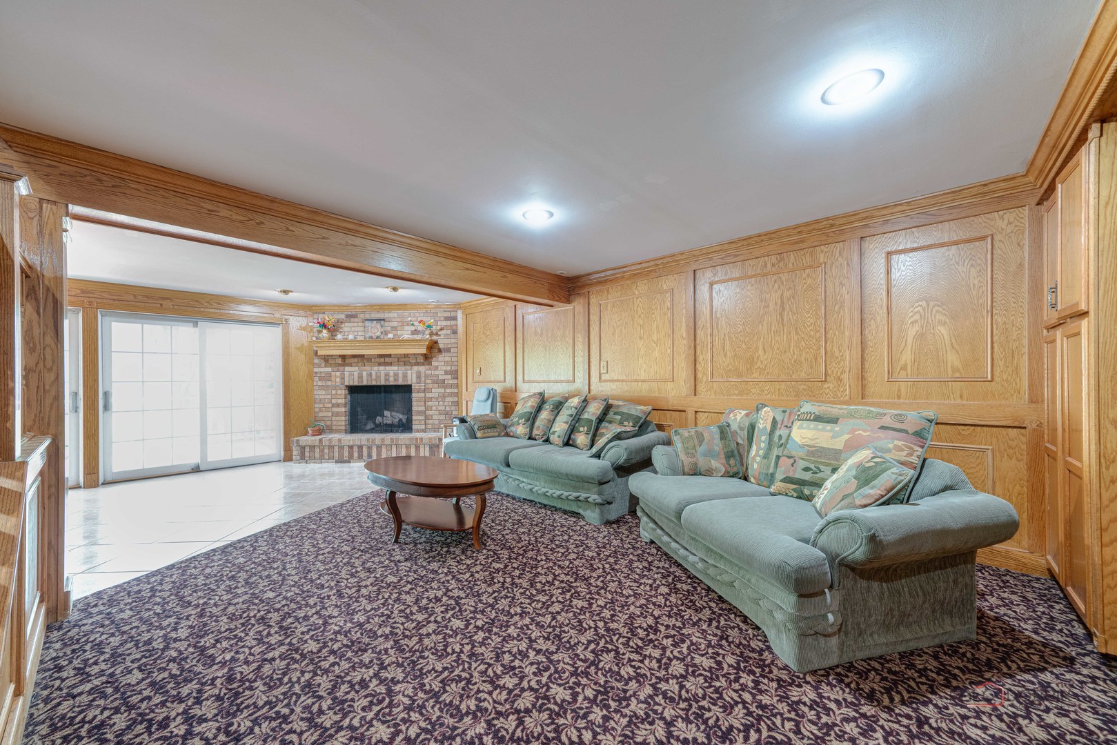 357 Roberts Road Inverness, IL 60010 - Photo 35 of 50 a living room with furniture and a fireplace