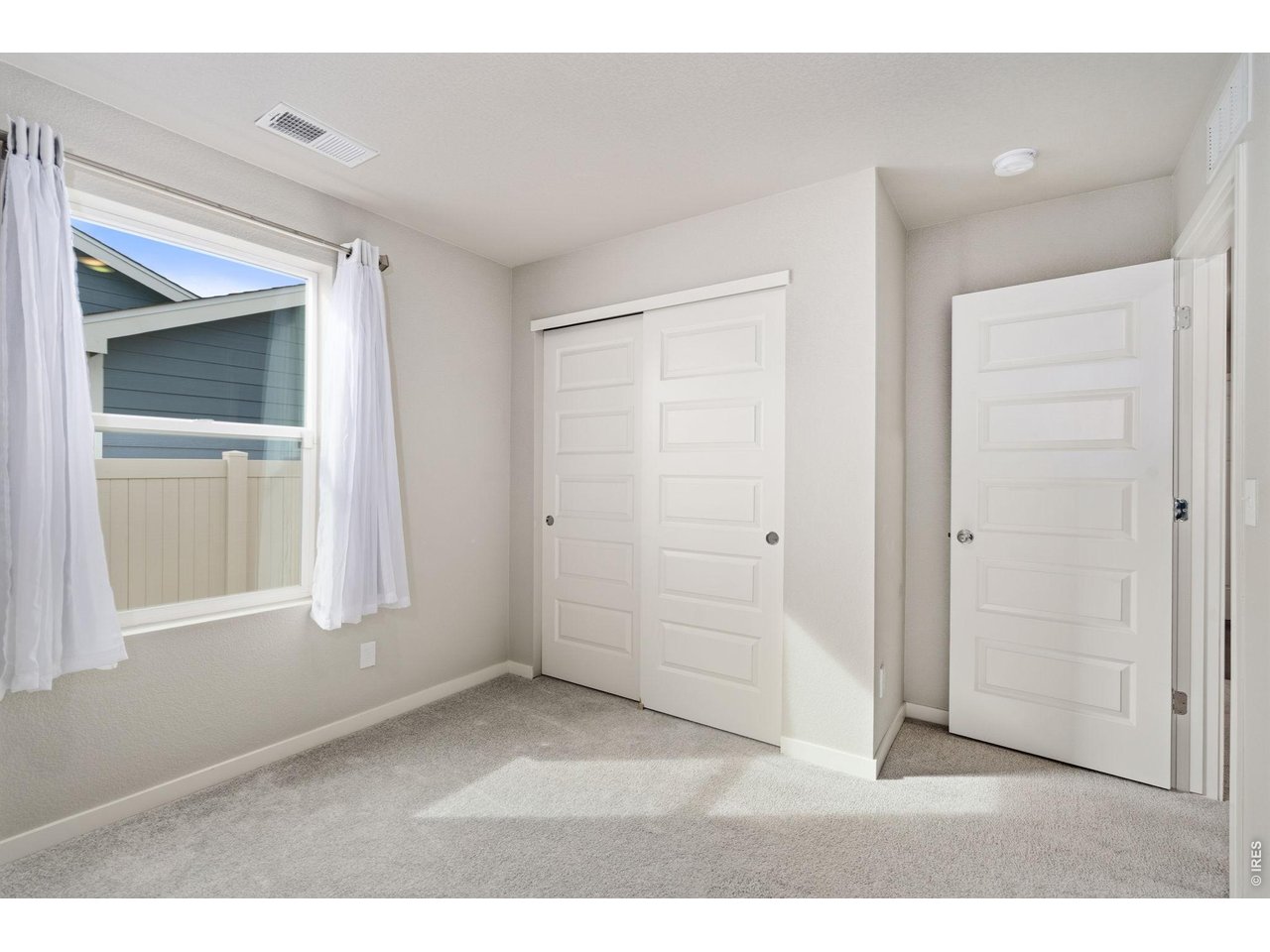 390 Cherokee Trail Ault, CO 80610 - Photo 18 of 37 a room with window and closet