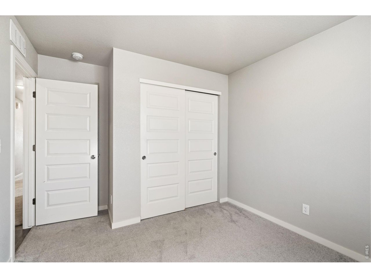 390 Cherokee Trail Ault, CO 80610 - Photo 20 of 37 an empty room with closet