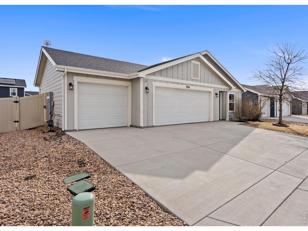 390 Cherokee Trail Ault, CO 80610 - Photo 2 of 37 a view of a house with a garage