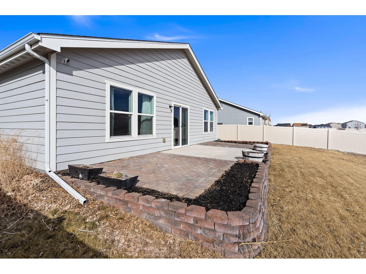 390 Cherokee Trail Ault, CO 80610 - Photo 31 of 37 a house view with a backyard space