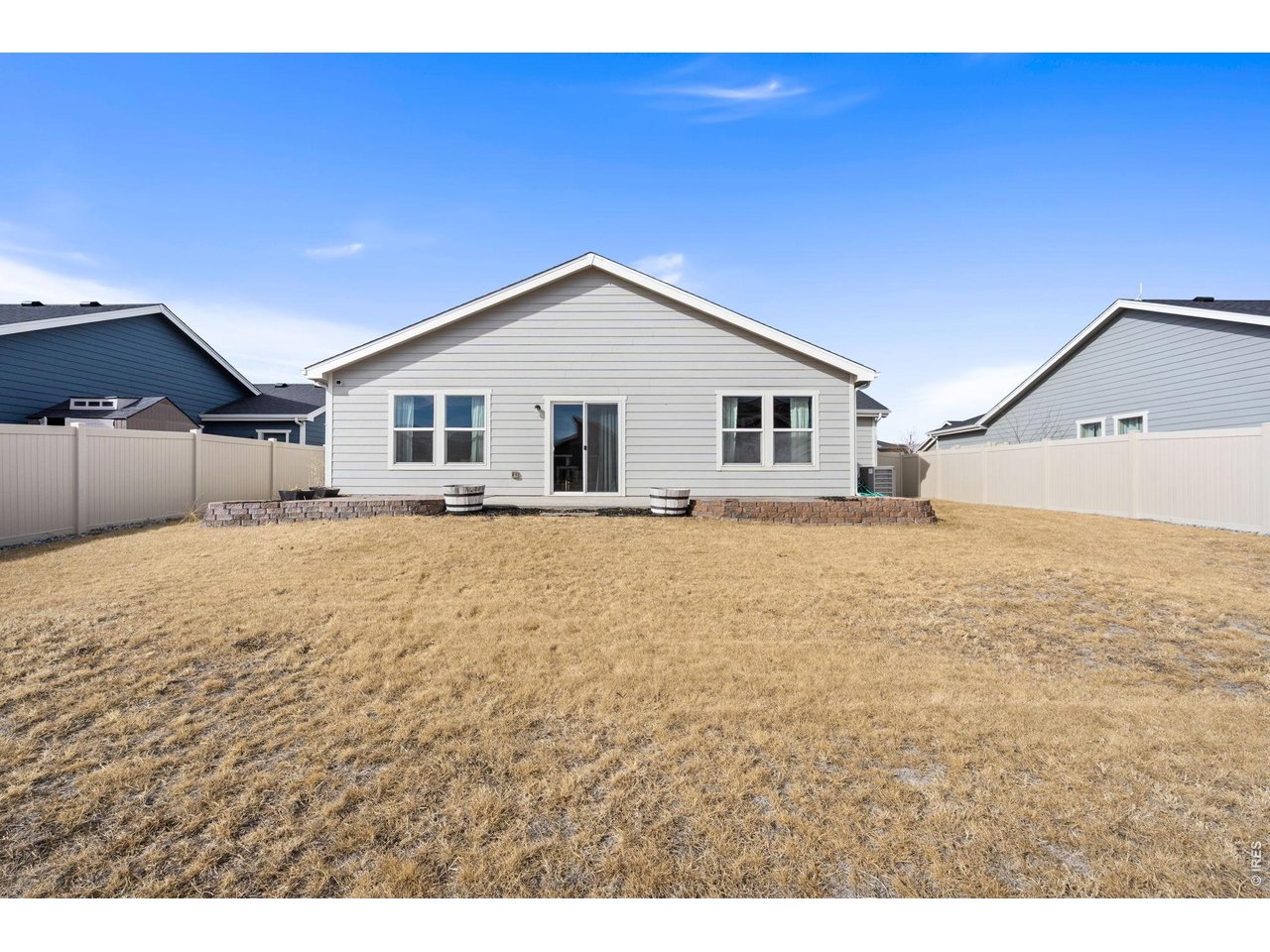 390 Cherokee Trail Ault, CO 80610 - Photo 35 of 37 a view of a house with a yard