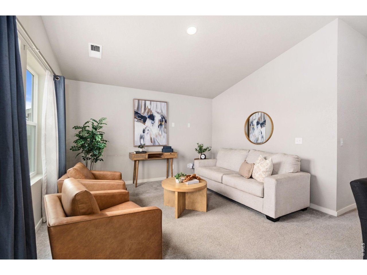 390 Cherokee Trail Ault, CO 80610 - Photo 6 of 37 a living room with furniture and a large window