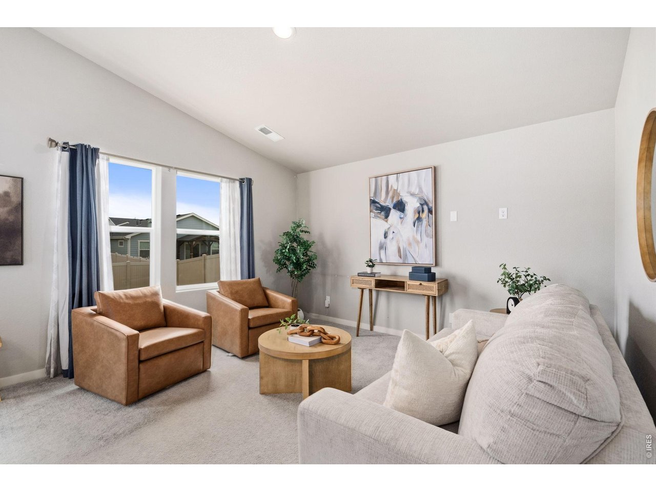 390 Cherokee Trail Ault, CO 80610 - Photo 7 of 37 a living room with furniture and a large window