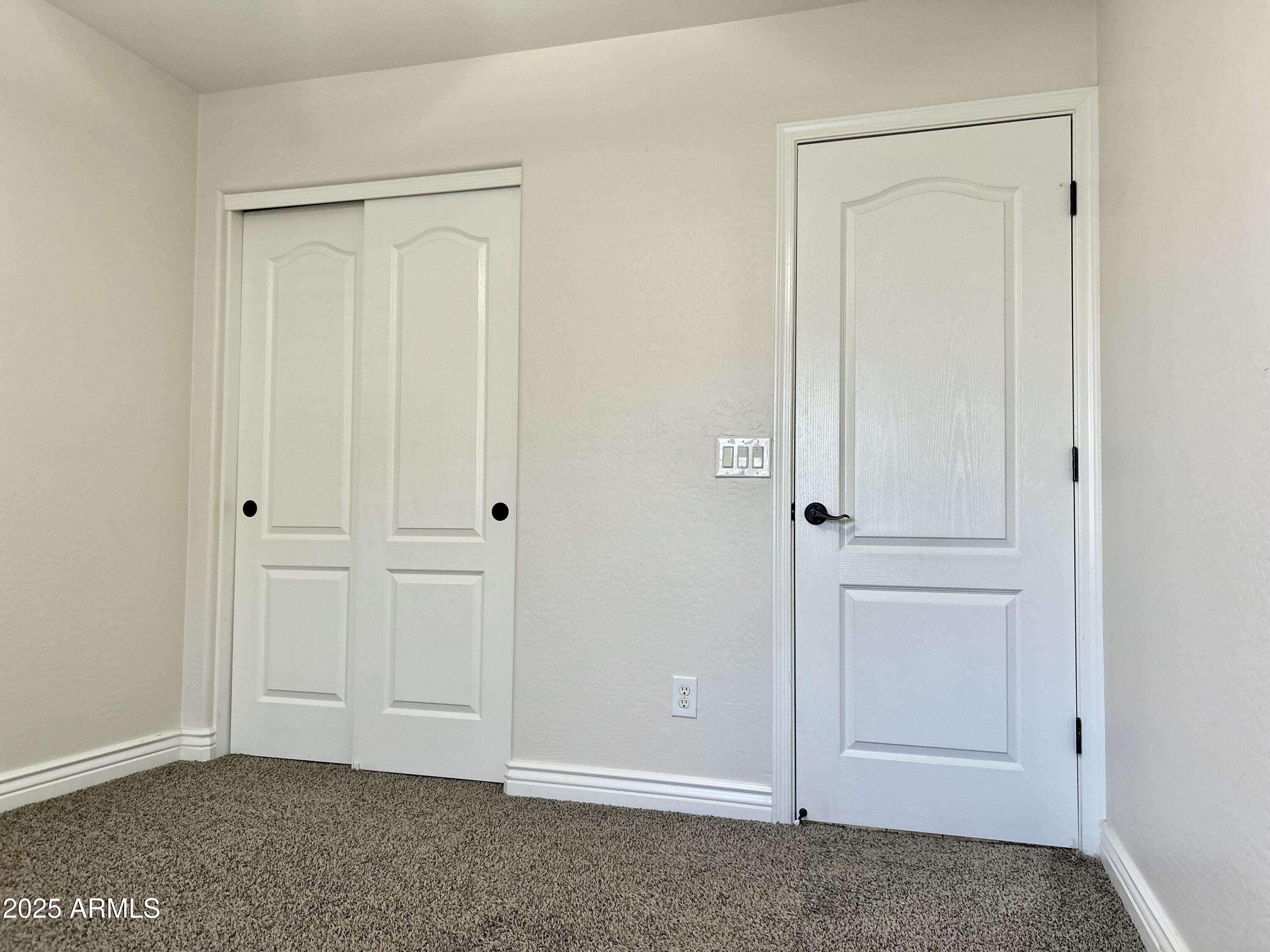 3853 East Santa Fe Lane Gilbert, AZ 85297 - Photo 19 of 23 an empty room with closet area