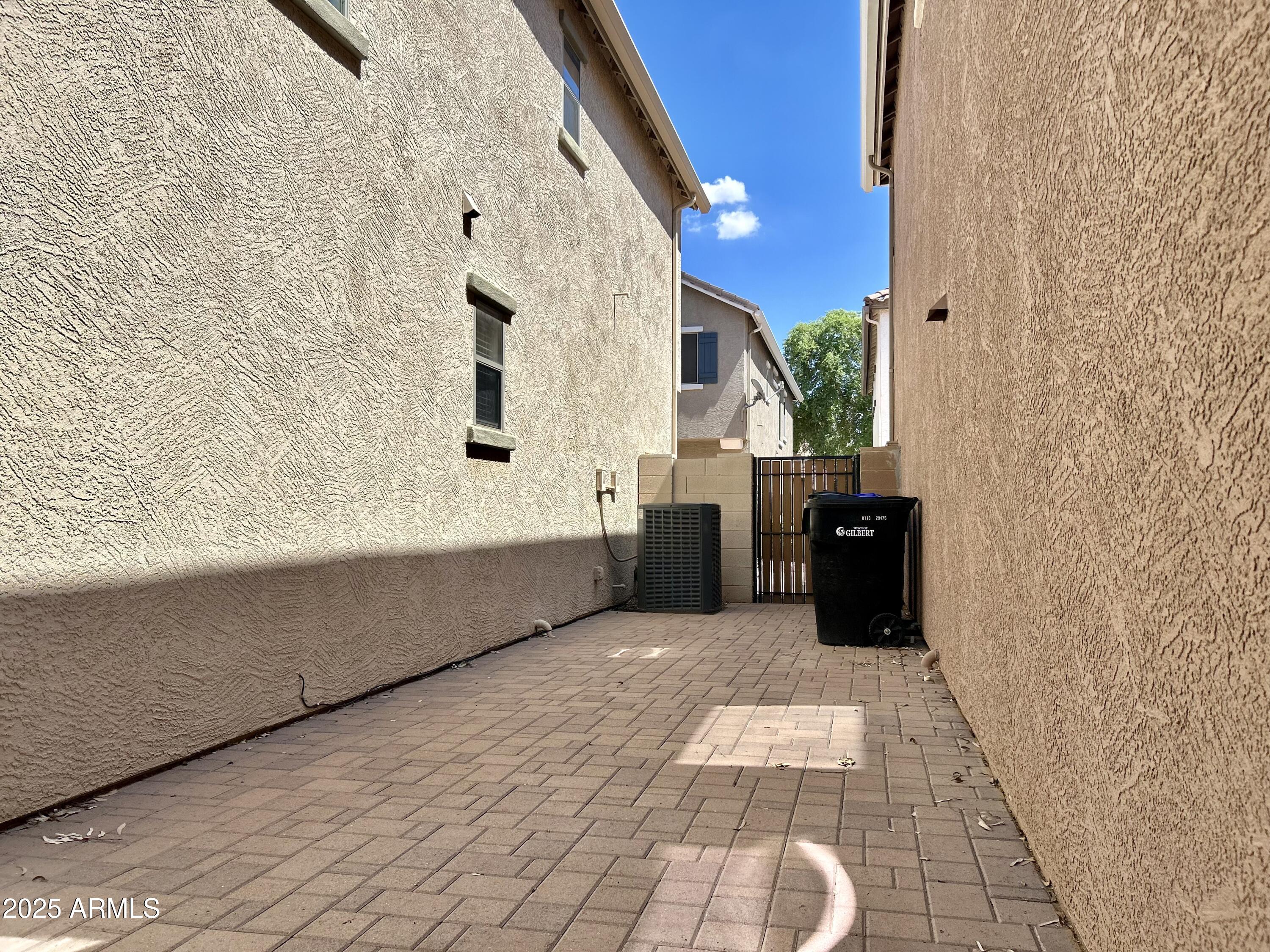 3853 East Santa Fe Lane Gilbert, AZ 85297 - Photo 22 of 23 a bathroom with a bathtub and shower