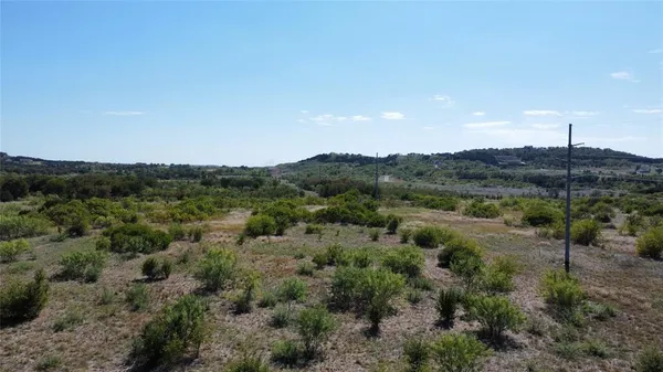 a view of a lush green field