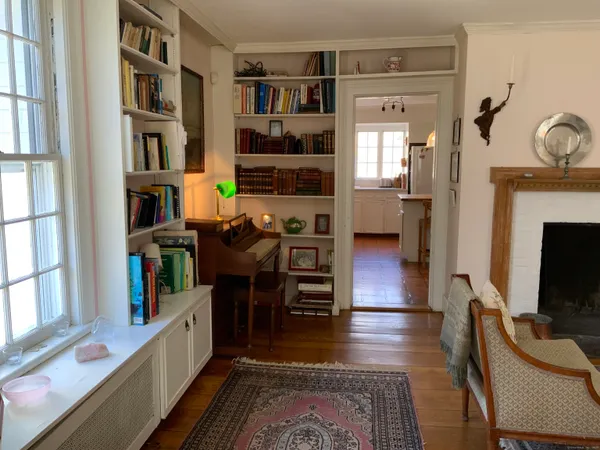 a view of a workspace with furniture