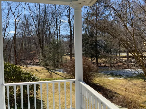 a view of swimming pool from a balcony