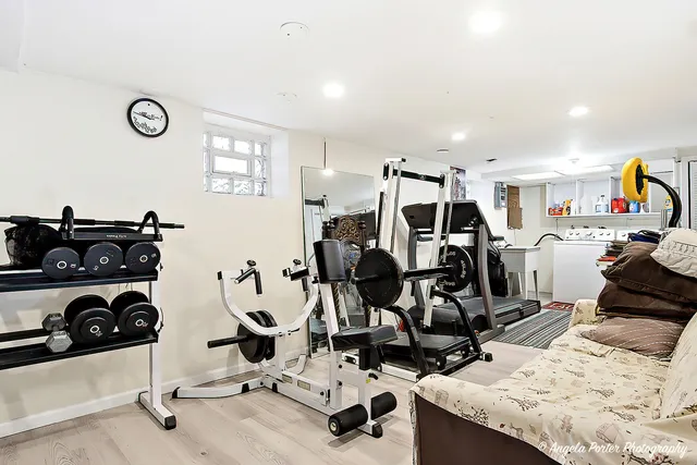 a room with gym equipment and equipment