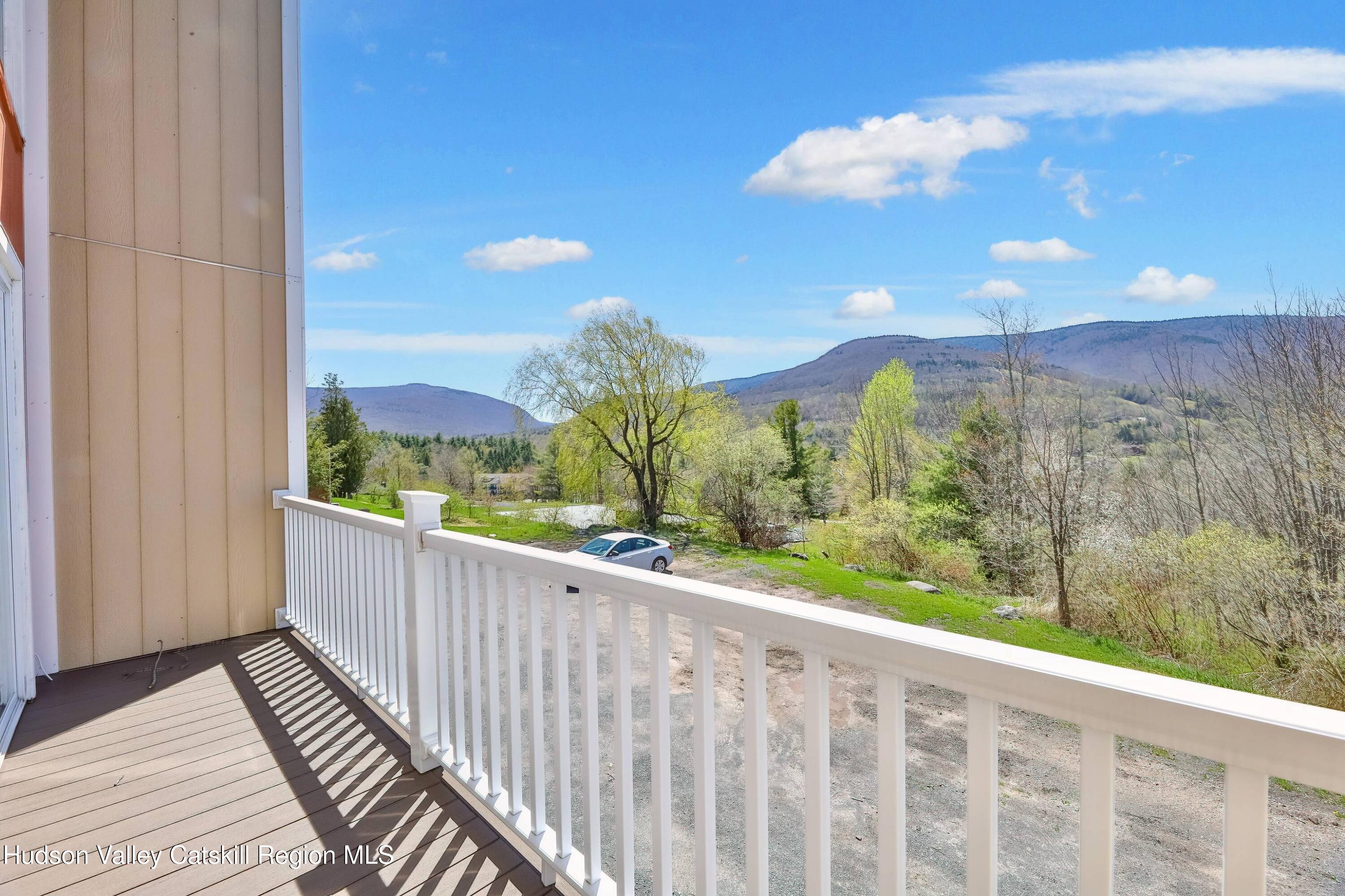 59 Scribner Hollow Road, Unit B2 Hunter, NY 12442 - Photo 27 of 42 a view of a balcony with an outdoor space